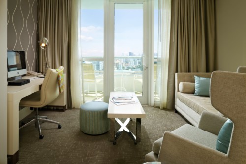 https://suiteness.imgix.net/destinations/miami/fontainebleau-miami-beach/suites/tr-sor-bay-view-one-bedroom-suite-tr-sor-bay-view-junior-suite/junior-suite-living-room.jpg?w=96px&h=64px&crop=edges&auto=compress,format