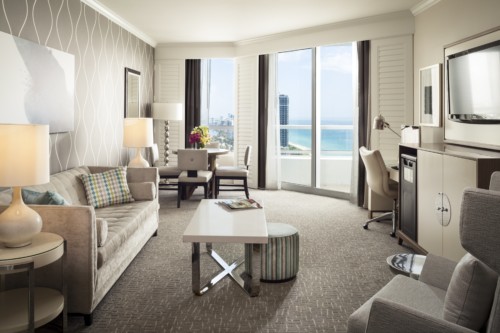 https://suiteness.imgix.net/destinations/miami/fontainebleau-miami-beach/suites/tr-sor-ocean-view-one-bedroom-suite-tr-sor-ocean-view-junior-suite/living-room.jpg?w=96px&h=64px&crop=edges&auto=compress,format